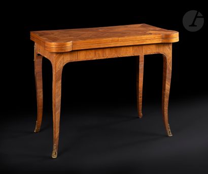 Rosewood and violet wood game table, with...