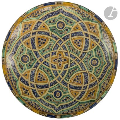 null Large tobsil dish with cosmographic decoration, Morocco, Fez, early 20th
centuryEarthenware...