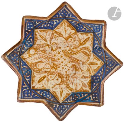  Star-shaped tile with quadruped decoration,...