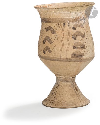 null Chalice decorated with birds between friezes of combsIran
, 4th-3rd millennium...