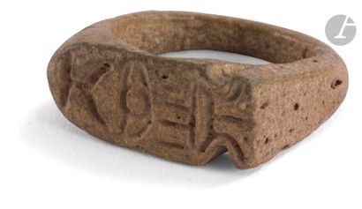 null Earthenware ring decorated on the openwork bezel with a profile of Horus with...