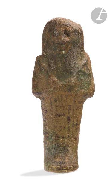 Inscribed Shaouabti holding the oratory instrumentsEgypt...