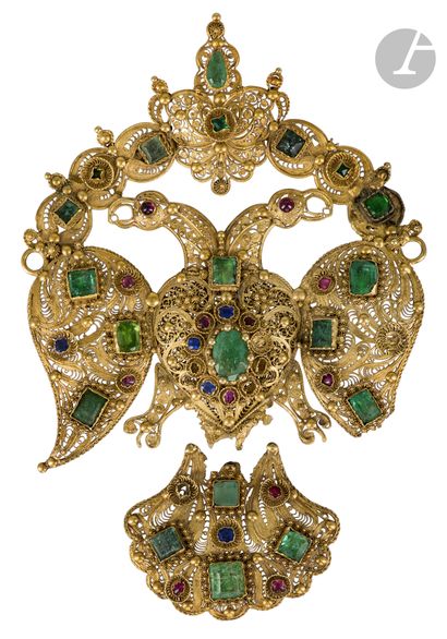 null 
Double-headed eagle pendant, Morocco, 19th century



Pendant with two lateral...