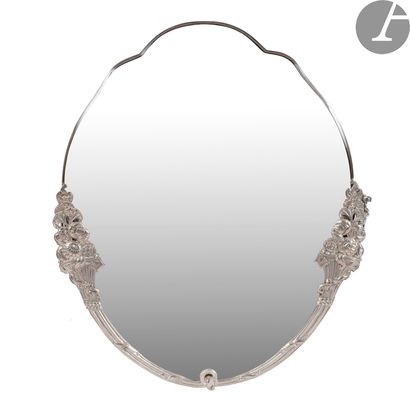 null STYLE ART DÉCO - GEORGES TERZIAN
COLLECTIONOval
mirror
in chromed metal decorated...
