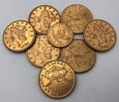 8 pièces de 20 Dollars en or, dans un sachet...