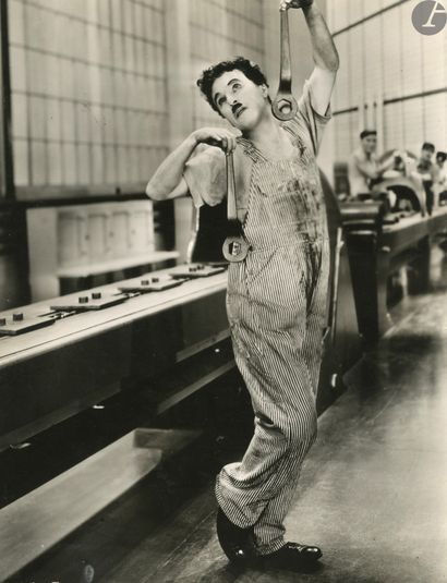 null Max Munn Autrey (attributed to
)Charlie Chaplin in Modern Times, 1936. 
Four...