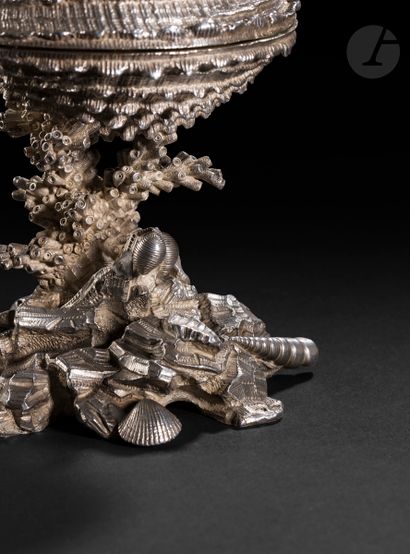  PARIS CIRCA 1845 - 1850 Saltcellar in chased cast silver featuring a bifacial shellfish...