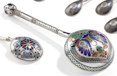 null 
MOSCOW 1875



Enameled silver cream spoon. 



Cylindrical handle decorated...