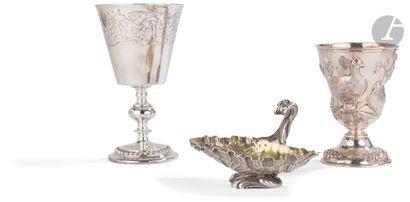  PARIS CIRCA 1850 Salt cellar in melted silver with chasing, the interior in vermeil....