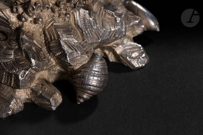  PARIS CIRCA 1845 - 1850 Saltcellar in chased cast silver featuring a bifacial shellfish...