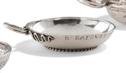  LA ROCHELLE 1759 Silver wine cup resting on a rope handle with two scrolls. The...