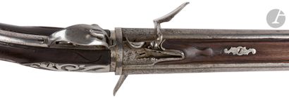 null Flintlock pistol with two revolving barrels, one hammer and two batteries.

Round...