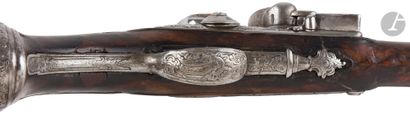 null Flintlock pommel gun.

Round barrel with flattened thunderbolt chased with foliage...