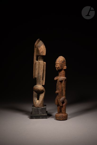 null A lot gathering two ancient female and male statuettes, with particularly cubist...