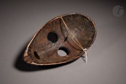 null Beautiful and ancient racing mask with round eyes and a characteristic high...