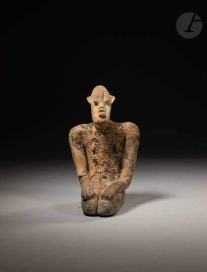 null Ancient and small sculpture, classical representation of a kneeling figure

Djenné...