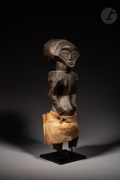 null Sculpture of a standing male ancestor, probably from the styles known as Muhona...