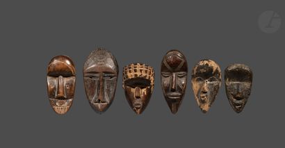 null A lot of six miniature masks, insignia of membership in the secret society of...