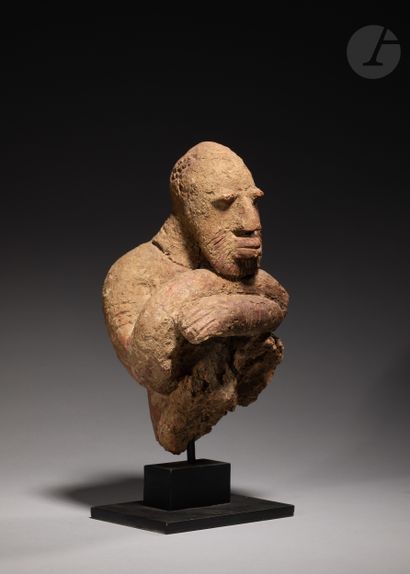 null Fragmentary bust of a handsome figure, with face and arms scarified with fine...