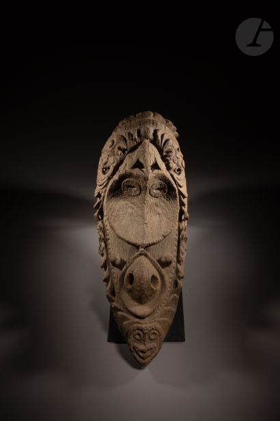 null Exceptional garamut drum front consisting of a large face in an elegant and...