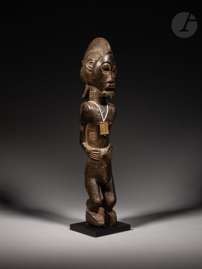 null Ancient and beautiful male waka sona statuette, undoubtedly an asie usu, embodied...