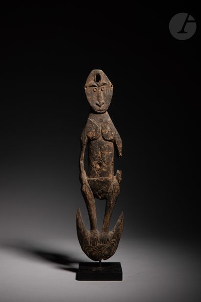 null Ancient food hanging hook sculpture, decorated with a female figure standing...