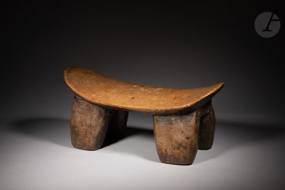 null Ancient four-legged stool of ovoid form

Nuna (Gurunsi), Burkina Faso

Wood,...
