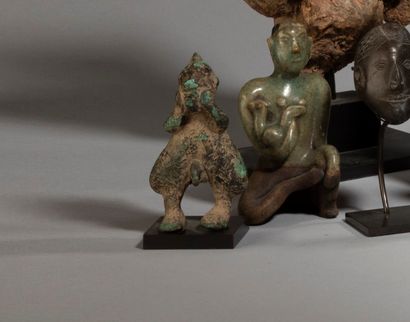 null 
Small bronze figurine of undetermined origin.




West Africa 




Bronze,...