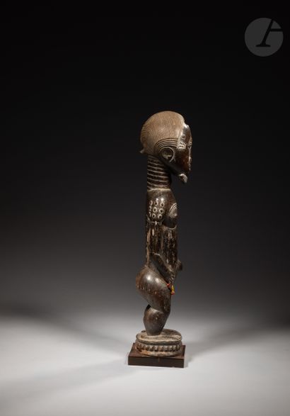 null Ancient and very beautiful male Waka sona statuette.

Probably a husband of...