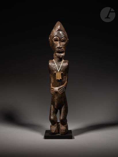 null Ancient and beautiful male waka sona statuette, undoubtedly an asie usu, embodied...