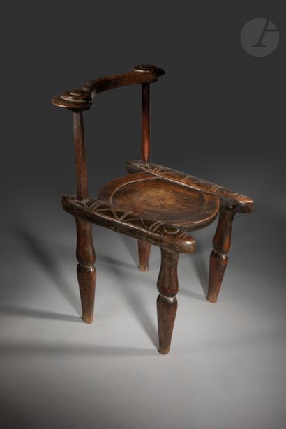 null Elegant and very old chair assembled with engraved decorations, the seat is...