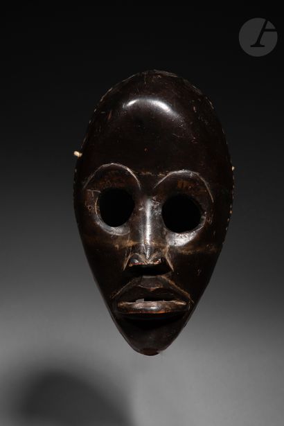 null Beautiful and ancient racing mask with round eyes and a characteristic high...