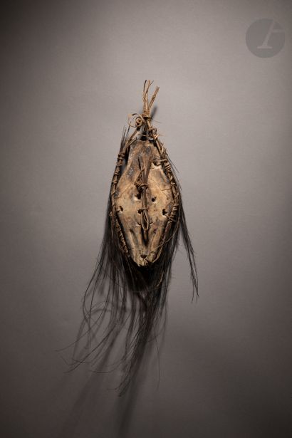 null Old and beautiful mask characteristic of this corpus, specimen complete in its...