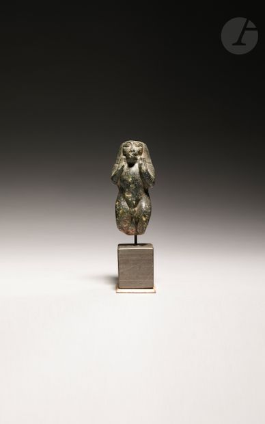Statuette of a hamadryas baboon, in the image...