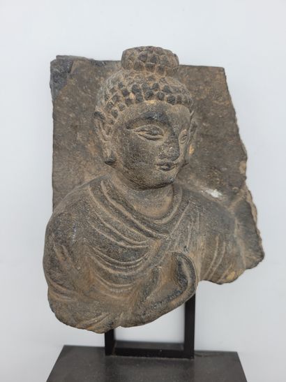 null Fragment of a bas-relief representing a bust of Buddha, India,
GandharaGrey...