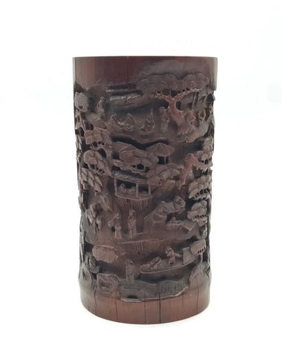 null Brush pot bitong, China, circa 1900In
bamboo carved with various animated scenes...