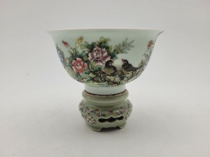 null 
Porcelain bowl decorated with birds in flowers, China, 20th century

Mounted...