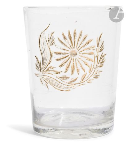 null Lot of two glasses: 
- Crystal glass cut and engraved with three branches of...