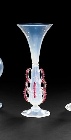 null Vase cone in opaline crystal "soap bubble". It is decorated with nine handles,...