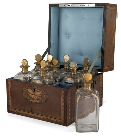 null Marquetry bottle case, containing nine glass bottles with gold highlights; (small...