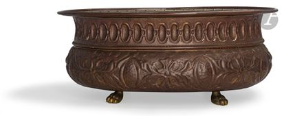  Copper basin stamped of oval form with decoration of ovals, flowers and pomegranates....