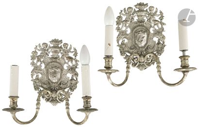  Suite of four sconces in silvered bronze, with two arms of light and openwork decoration...