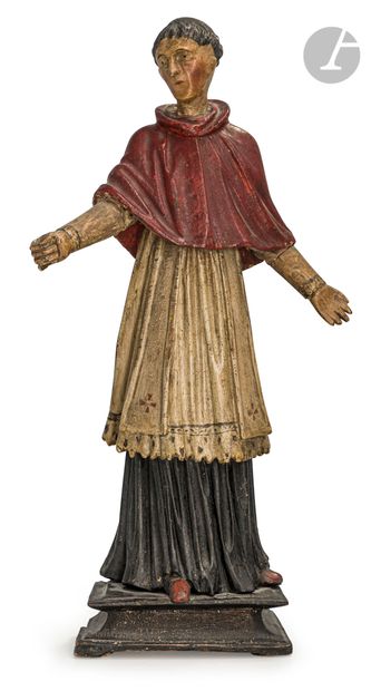  Saint ecclésiastique en bois sculpté en ronde-bosse et polychromé. XVIIIe siècle...
