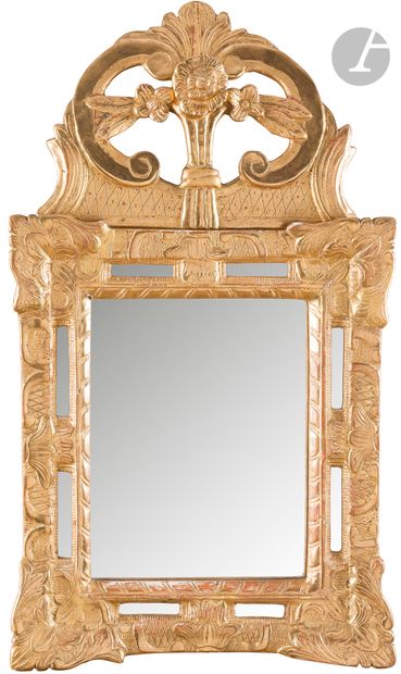 null Gilded wood mirror with openwork pediment and foliage decoration; (gilding redone...