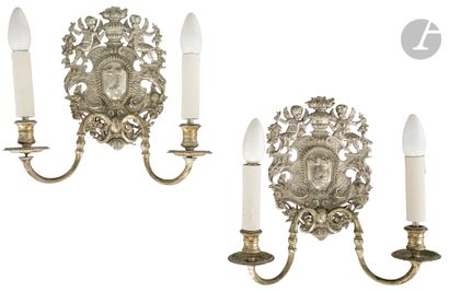 null Suite of four sconces in silvered bronze, with two arms of light and openwork...