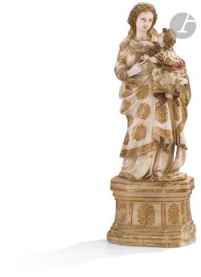  Vierge à l’Enfant en albâtre sculpté, avec rehauts d’or et restes de polychromie,...
