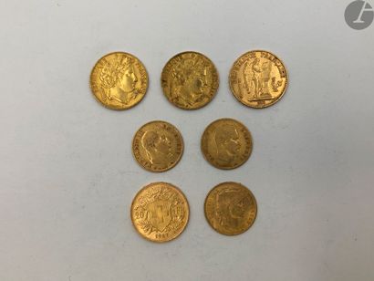  Lot de 7 pièces françaises et suisse, en or: 
- 2 pièces de 20 Francs en or. Type...