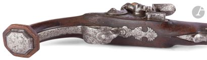 null 
Officer's flintlock pistol. {CR}Round barrel with flats on the top and thunderbolts....