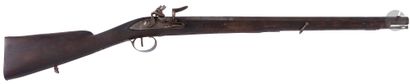 null 
Flintlock hunting rifle. {CR} Fluted barrel with fluted edges. Breechblock...