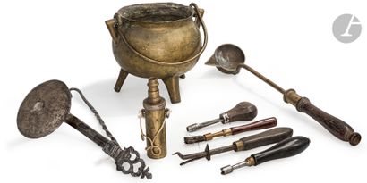 null A bronze cauldron, three armorer's utensils, a fireplace remover, a bronze powder...